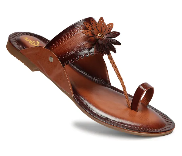 A_pair_of_stylish_women�s_slip-on_loafers_in_a_warm_tan/brown_color_with_a_subtle_ribbed_texture.