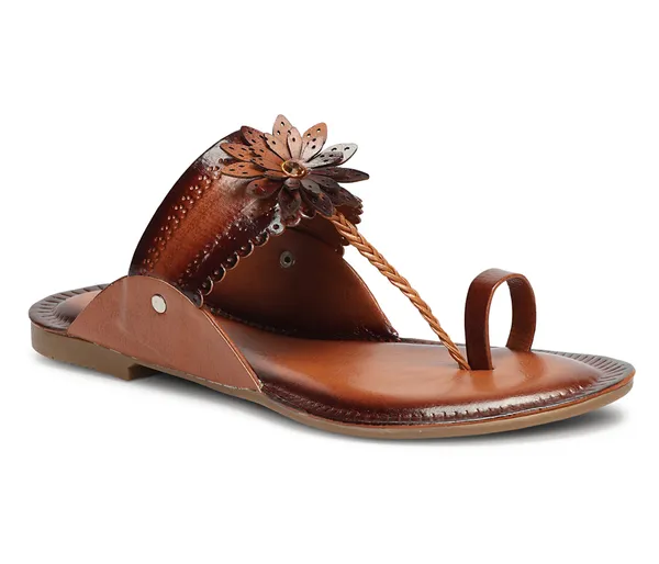 A_pair_of_stylish_women�s_slip-on_loafers_in_a_warm_tan/brown_color_with_a_subtle_ribbed_texture.