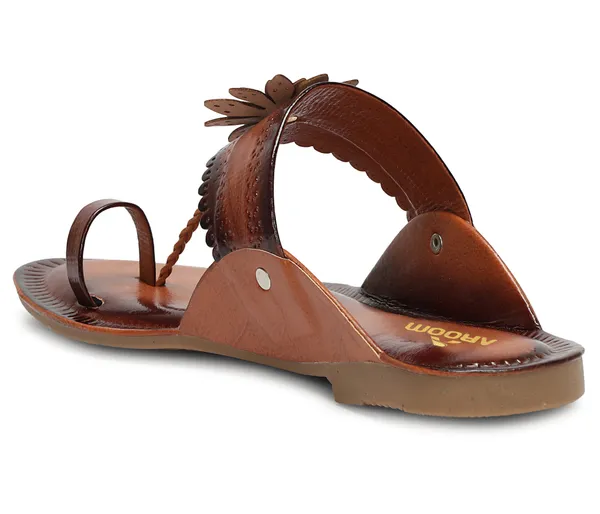 A_pair_of_stylish_women�s_slip-on_loafers_in_a_warm_tan/brown_color_with_a_subtle_ribbed_texture.