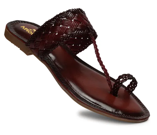 A_pair_of_stylish_women�s_slip-on_loafers_in_a_warm_tan/brown_color_with_a_subtle_ribbed_texture.
