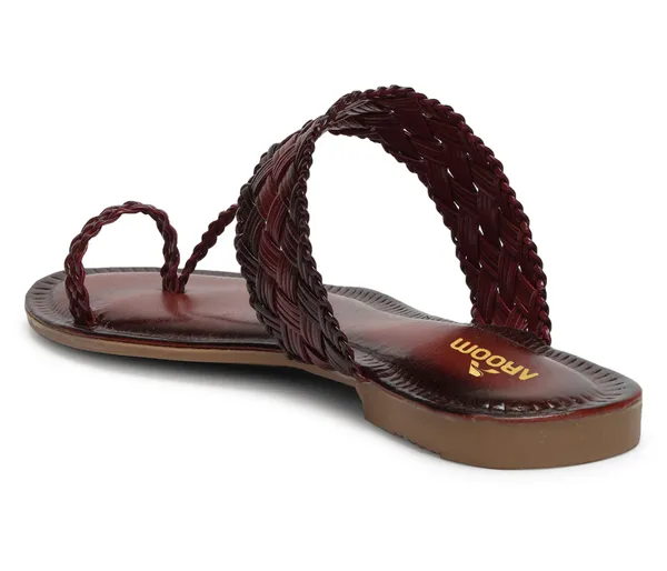 A_pair_of_stylish_women�s_slip-on_loafers_in_a_warm_tan/brown_color_with_a_subtle_ribbed_texture.