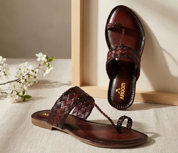 A_pair_of_stylish_women�s_slip-on_loafers_in_a_warm_tan/brown_color_with_a_subtle_ribbed_texture.