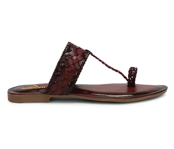 A_pair_of_stylish_women�s_slip-on_loafers_in_a_warm_tan/brown_color_with_a_subtle_ribbed_texture.