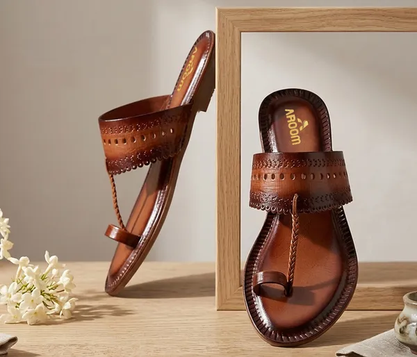A_pair_of_stylish_women�s_slip-on_loafers_in_a_warm_tan/brown_color_with_a_subtle_ribbed_texture.