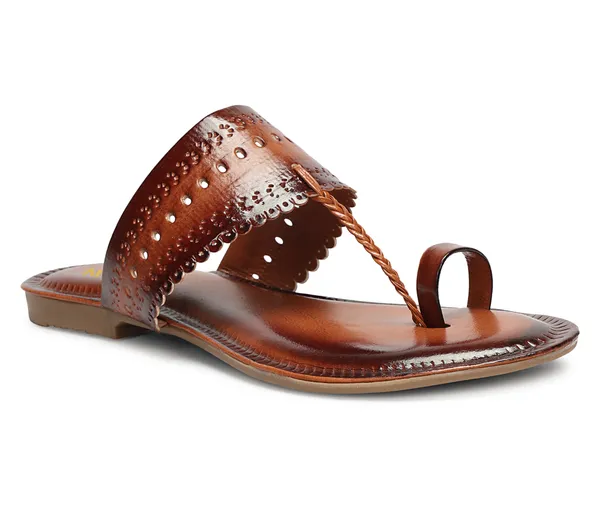 A_pair_of_stylish_women�s_slip-on_loafers_in_a_warm_tan/brown_color_with_a_subtle_ribbed_texture.