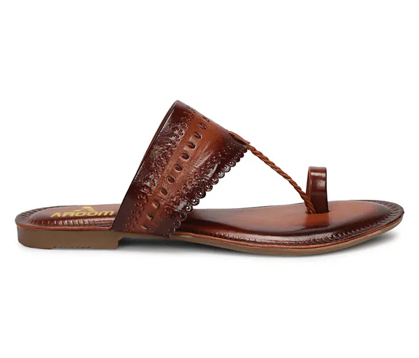 A_pair_of_stylish_women�s_slip-on_loafers_in_a_warm_tan/brown_color_with_a_subtle_ribbed_texture.