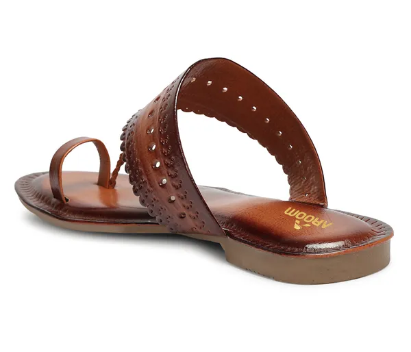 A_pair_of_stylish_women�s_slip-on_loafers_in_a_warm_tan/brown_color_with_a_subtle_ribbed_texture.
