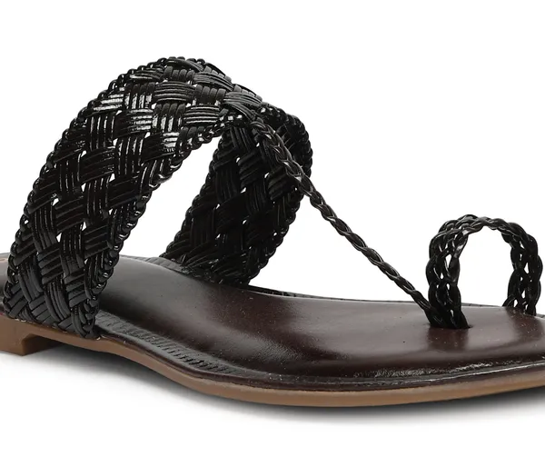 A_pair_of_stylish_women�s_slip-on_loafers_in_a_warm_tan/brown_color_with_a_subtle_ribbed_texture.