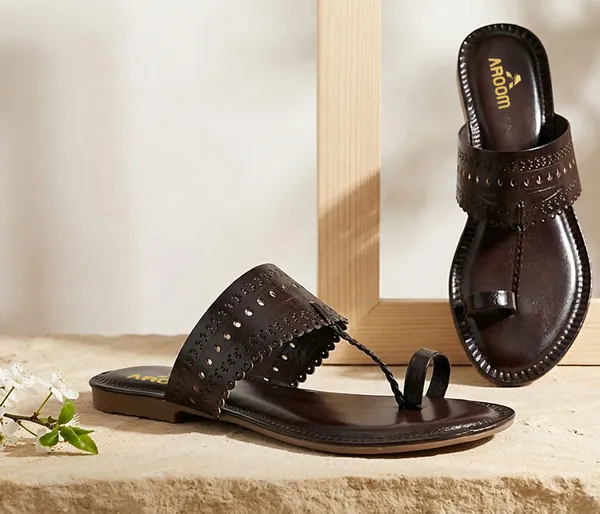 A_pair_of_stylish_women�s_slip-on_loafers_in_a_warm_tan/brown_color_with_a_subtle_ribbed_texture.