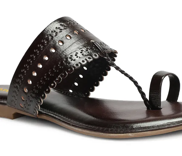 A_pair_of_stylish_women�s_slip-on_loafers_in_a_warm_tan/brown_color_with_a_subtle_ribbed_texture.