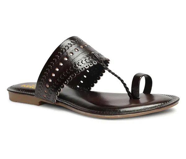 A_pair_of_stylish_women�s_slip-on_loafers_in_a_warm_tan/brown_color_with_a_subtle_ribbed_texture.