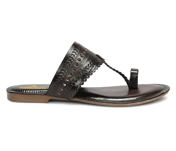 A_pair_of_stylish_women�s_slip-on_loafers_in_a_warm_tan/brown_color_with_a_subtle_ribbed_texture.