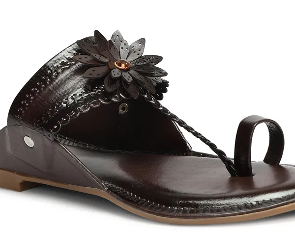A_pair_of_stylish_women�s_slip-on_loafers_in_a_warm_tan/brown_color_with_a_subtle_ribbed_texture.