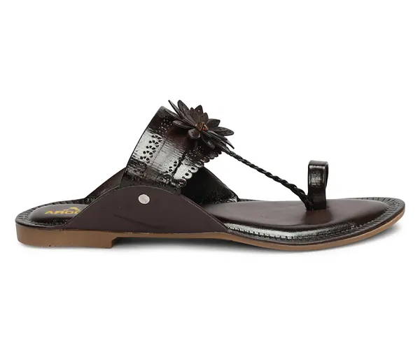 A_pair_of_stylish_women�s_slip-on_loafers_in_a_warm_tan/brown_color_with_a_subtle_ribbed_texture.