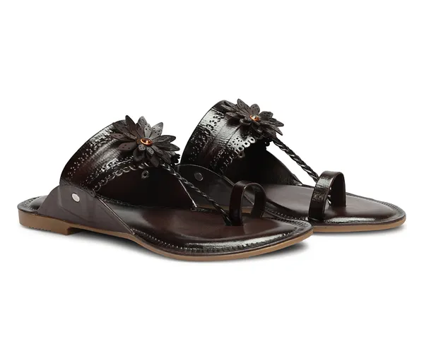 A_pair_of_stylish_women�s_slip-on_loafers_in_a_warm_tan/brown_color_with_a_subtle_ribbed_texture.
