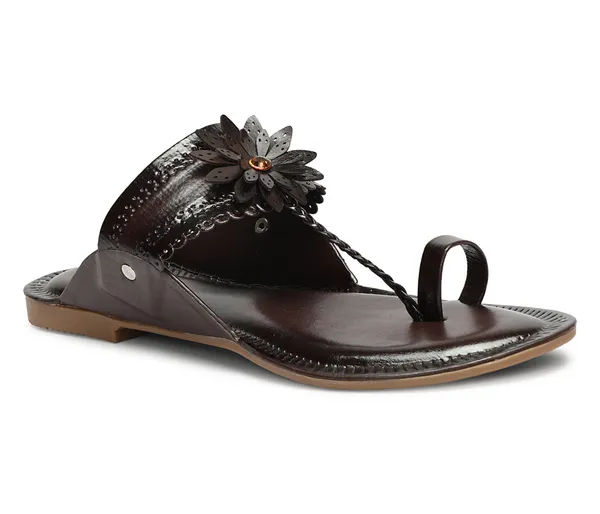 A_pair_of_stylish_women�s_slip-on_loafers_in_a_warm_tan/brown_color_with_a_subtle_ribbed_texture.