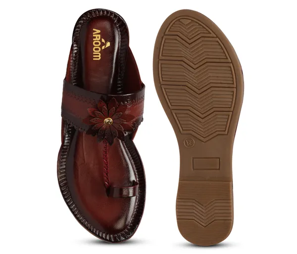 A_pair_of_stylish_women�s_slip-on_loafers_in_a_warm_tan/brown_color_with_a_subtle_ribbed_texture.