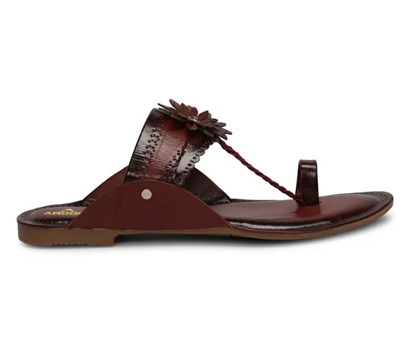A_pair_of_stylish_women�s_slip-on_loafers_in_a_warm_tan/brown_color_with_a_subtle_ribbed_texture.