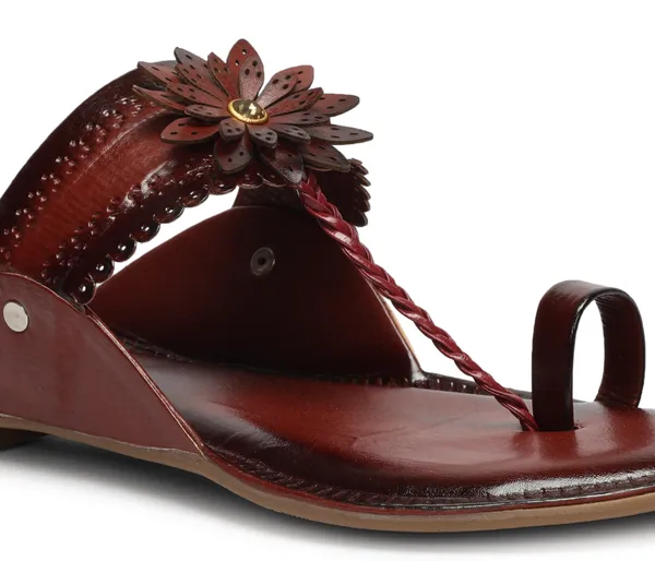 A_pair_of_stylish_women�s_slip-on_loafers_in_a_warm_tan/brown_color_with_a_subtle_ribbed_texture.