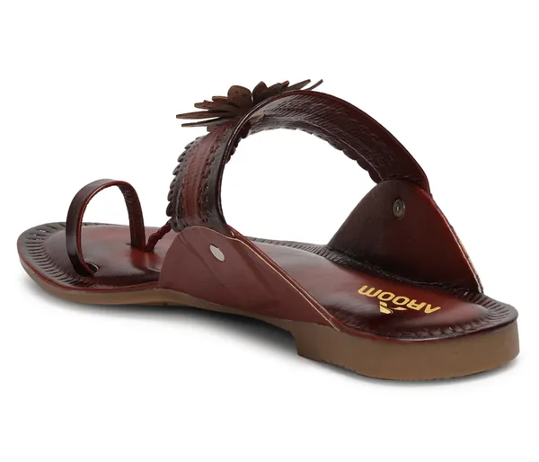 A_pair_of_stylish_women�s_slip-on_loafers_in_a_warm_tan/brown_color_with_a_subtle_ribbed_texture.