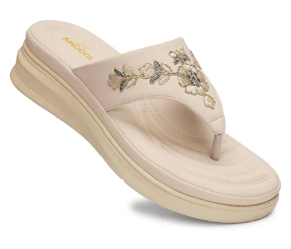 A_pair_of_stylish_women�s_slip-on_loafers_in_a_warm_tan/brown_color_with_a_subtle_ribbed_texture.