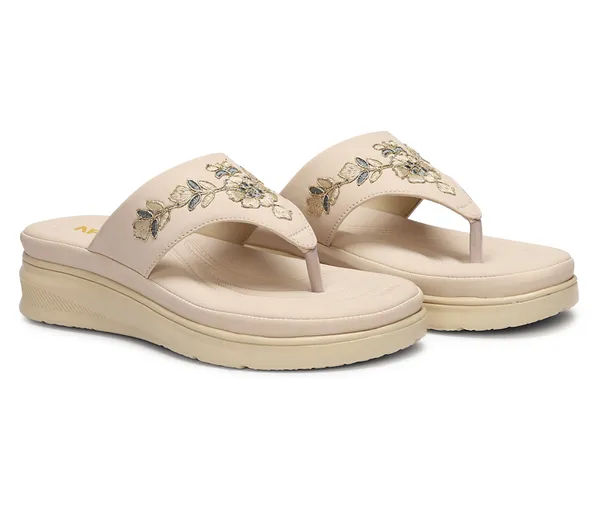 A_pair_of_stylish_women�s_slip-on_loafers_in_a_warm_tan/brown_color_with_a_subtle_ribbed_texture.