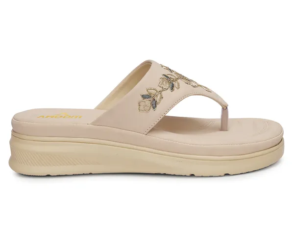 A_pair_of_stylish_women�s_slip-on_loafers_in_a_warm_tan/brown_color_with_a_subtle_ribbed_texture.