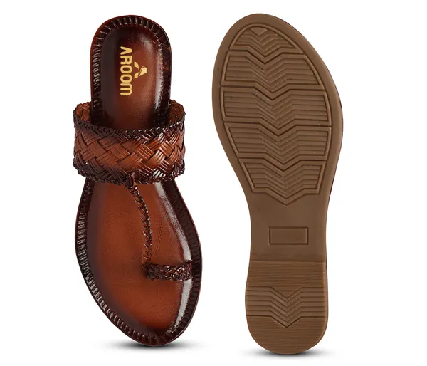 A_pair_of_stylish_women�s_slip-on_loafers_in_a_warm_tan/brown_color_with_a_subtle_ribbed_texture.