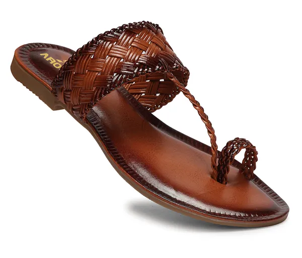A_pair_of_stylish_women�s_slip-on_loafers_in_a_warm_tan/brown_color_with_a_subtle_ribbed_texture.