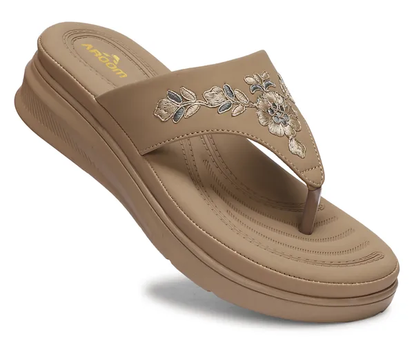 A_pair_of_stylish_women�s_slip-on_loafers_in_a_warm_tan/brown_color_with_a_subtle_ribbed_texture.