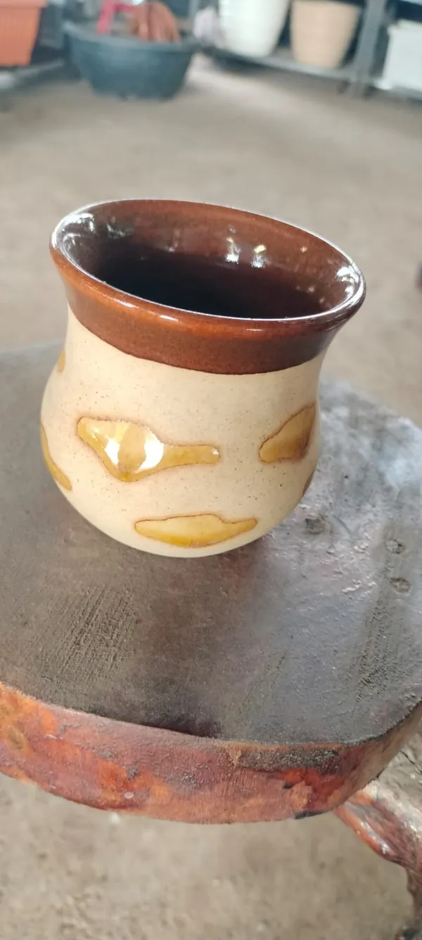 Handcrafted_Ceramic_Coffee_Mug_With_Brown_Glaze_And_Yellow_Drip_Design