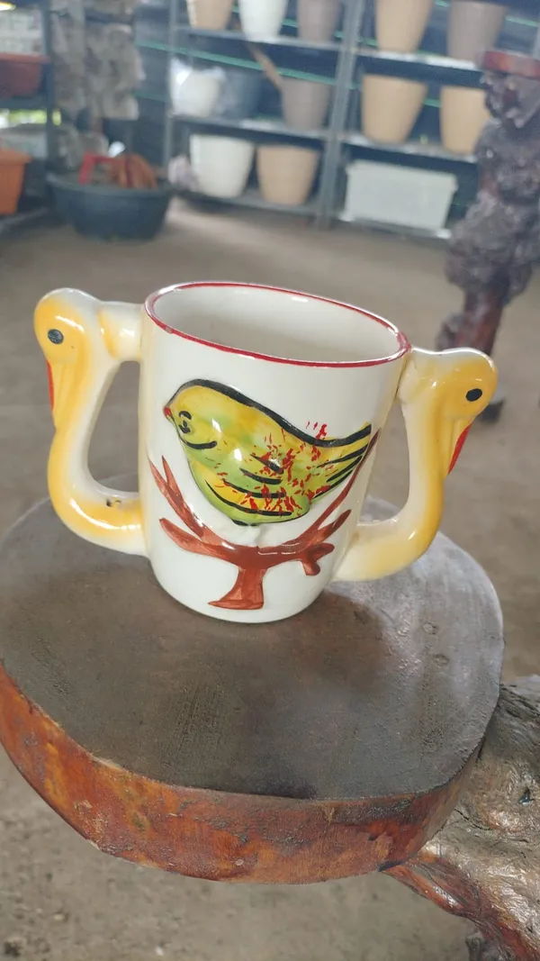 Handcrafted_Ceramic_Duck-Shaped_Mug_With_Dual_Handles