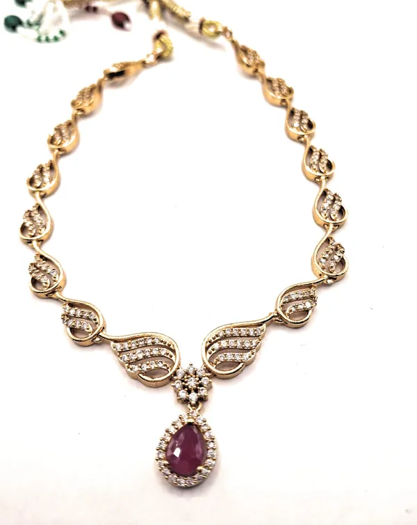 Gold_Polished_Alloy_And_Gold_Plated_And_Artificial_Stones_Premium_Jewellery_Set_For_Women