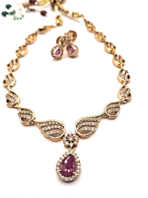 Gold_Polished_Alloy_And_Gold_Plated_And_Artificial_Stones_Premium_Jewellery_Set_For_Women