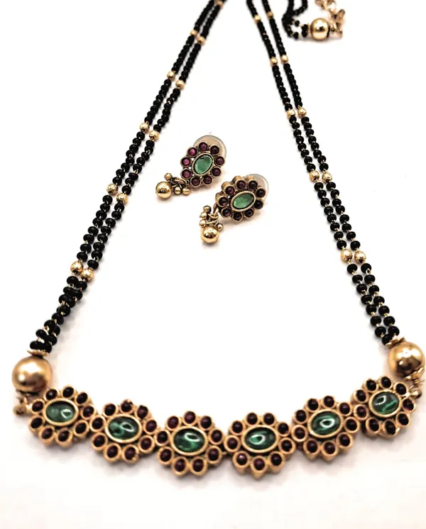 Gold_Polished_Alloy_And_Gold_Plated_And_Artificial_Stones_And_Black_Beads_Premium_Mangalsutra_For_Women