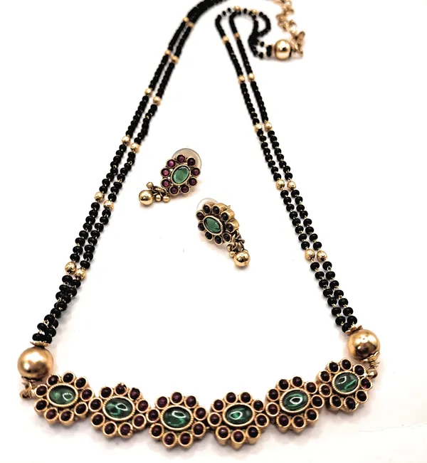 Gold_Polished_Alloy_And_Gold_Plated_And_Artificial_Stones_And_Black_Beads_Premium_Mangalsutra_For_Women