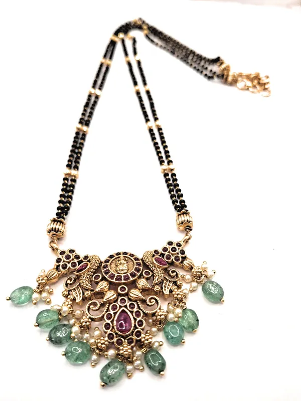 Gold_Polished_Alloy_And_Gold_Plated_And_Artificial_Stones_And_Black_Beads_Premium_Mangalsutra_Set_For_Women