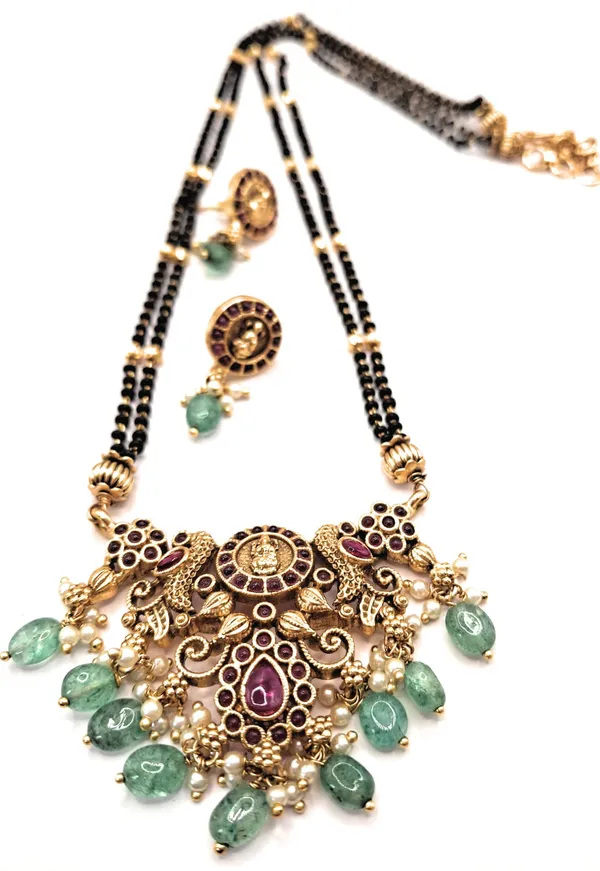 Gold_Polished_Alloy_And_Gold_Plated_And_Artificial_Stones_And_Black_Beads_Premium_Mangalsutra_Set_For_Women
