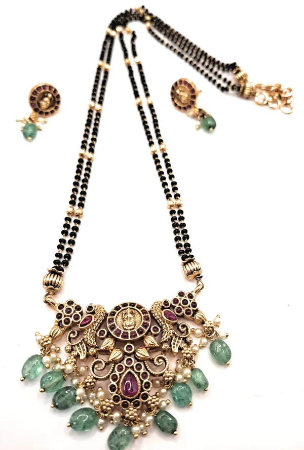 Gold_Polished_Alloy_And_Gold_Plated_And_Artificial_Stones_And_Black_Beads_Premium_Mangalsutra_Set_For_Women