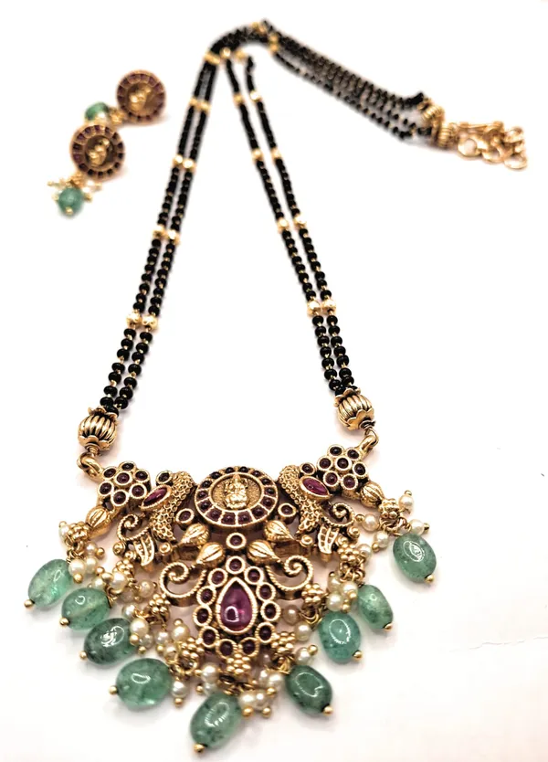 Gold_Polished_Alloy_And_Gold_Plated_And_Artificial_Stones_And_Black_Beads_Premium_Mangalsutra_Set_For_Women