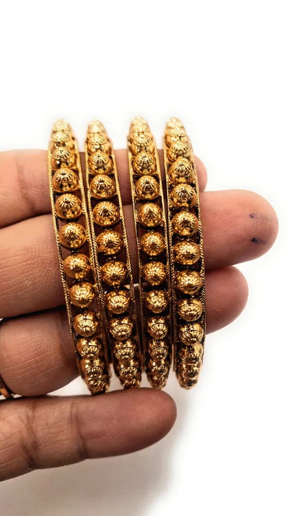 Gold_Polished_Alloy_And_Gold_Plated_Premium_Bangles_For_Women