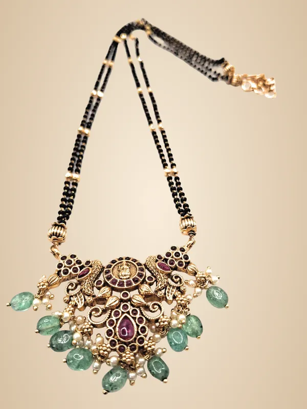 Gold_Polished_Alloy_And_Gold_Plated_And_Artificial_Stones_And_Black_Beads_Premium_Mangalsutra_Set_For_Women