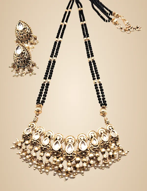 Gold_Polished_Alloy_And_Gold_Plated_And_Artificial_Stones_And_Black_Beads_Premium_Mangalsutra_For_Women