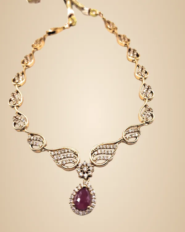 Gold_Polished_Alloy_And_Gold_Plated_And_Artificial_Stones_Premium_Jewellery_Set_For_Women