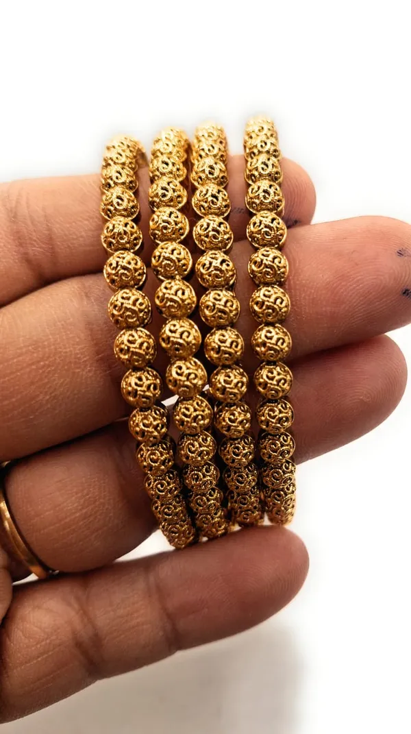 Gold_Polished_Alloy_And_Gold_Plated_Premium_Bangles_For_Women