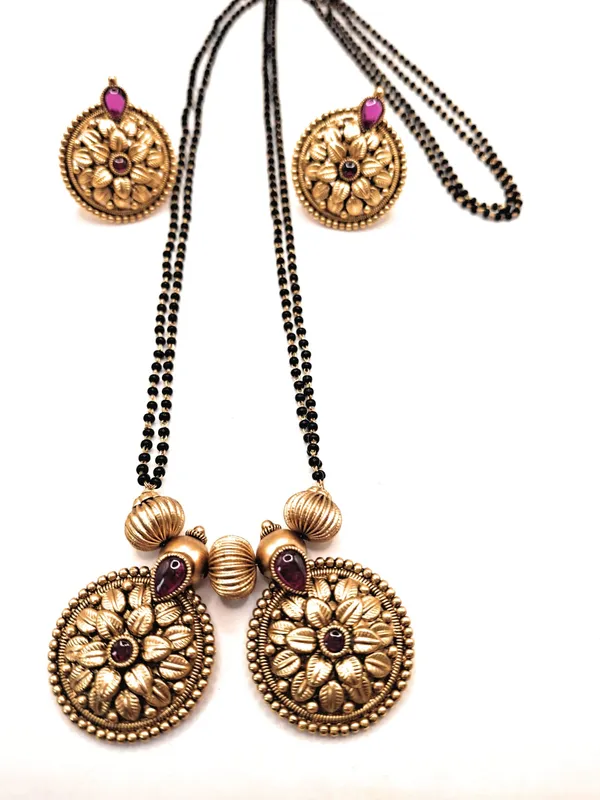 Gold_Polished_Alloy_And_Gold_Plated_And_American_Diamond_And_Artificial_Stones_Premium_Mangalsutra_Set_For_Women