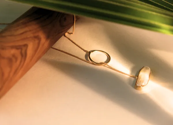 White_Pearl_Crystal_Gold_Plated_Birthstone_For_June_Born_Individuals