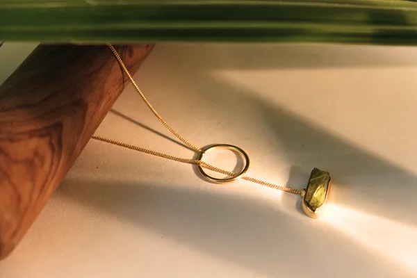 Olive_Green_Peridot_Crystal_Gold_Plated_Birthstone_For_August_Born_Individuals