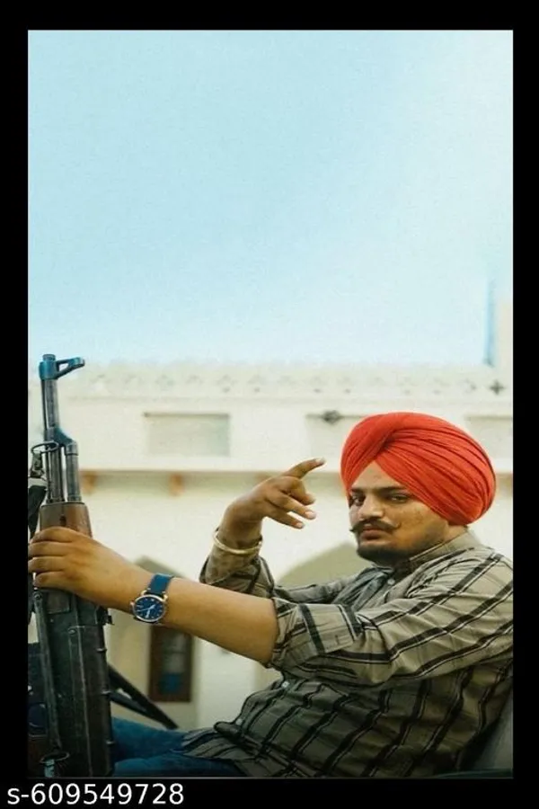 Sidhu_Moose_Wala_Holding_Wooden_Frame