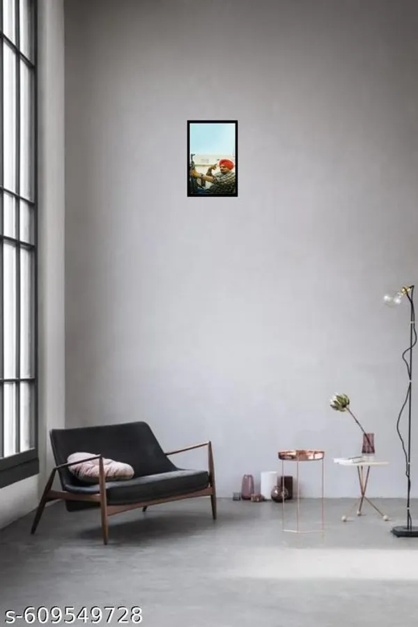 Sidhu_Moose_Wala_Holding_Wooden_Frame